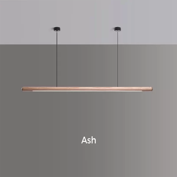 An ash wood pendant light is installed on the ceiling using a circular canopy, cables, and steel wires.