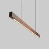 Close-up view of a high-power linear LED chandelier in walnut wood, showcasing a rich dark brown shade.