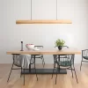 High power linear ash wood suspension chandelier hangs from the ceiling above the dining table.