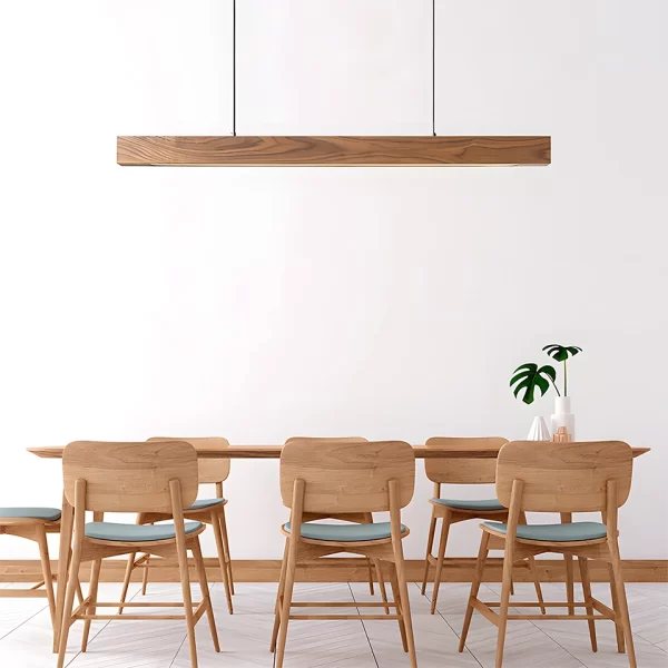 The meeting room is embellished with a high power linear walnut pendant light.