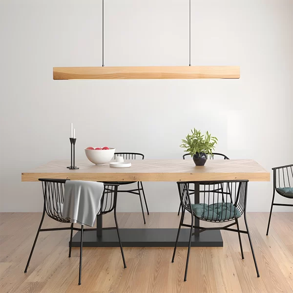 High power linear ash wood suspension chandelier hangs from the ceiling above the dining table.