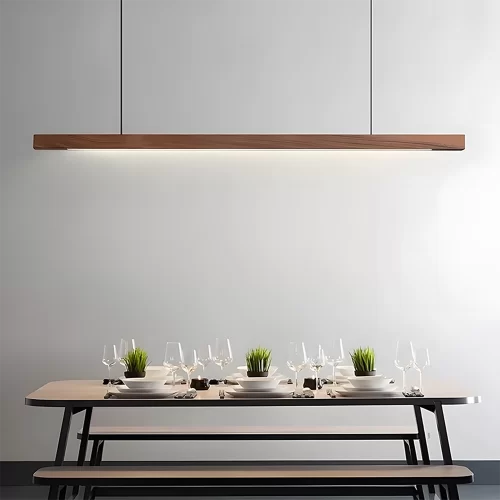 A black walnut pendant light hangs above a table set with dinnerware.