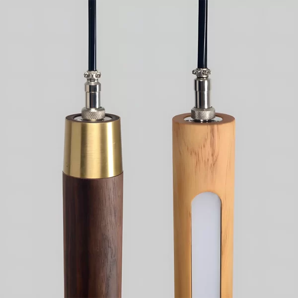 Two Vertical Wooden Pendant Lamp, one made of pine wood with a light tan hue, and the other made of black walnut wood showcasing a rich dark brown shade