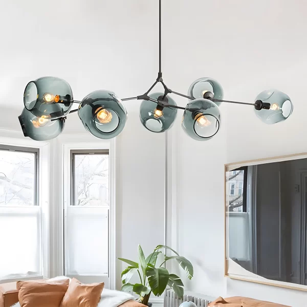 Black Smoke Grey Branch Glass Cup Ceiling Pendant hangs elegantly above the living room sofa