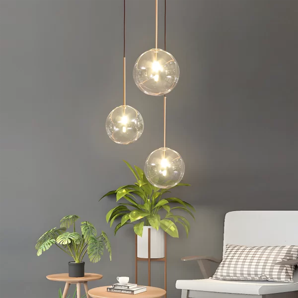 Glass Ball Pendant Light hangs elegantly in the corner of the bedroom and emits a warm and cozy light.