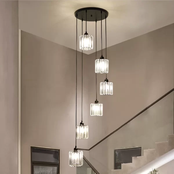 Round Modern Crystal Chandelier hangs above the ceiling at the staircase, emitting a warm and cozy glow