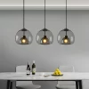 Smoke Grey Nordic Glass Ceiling Light hangs elegantly above the kitchen table