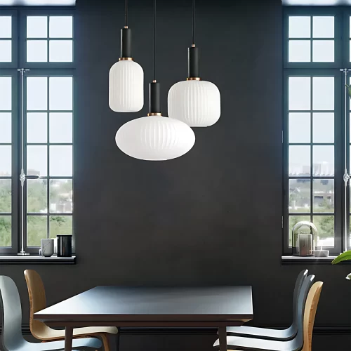 Three types of white Retro Drum Glass Hanging Light are hung above the dining table.