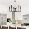 Black 6-head Candle Chandelier hangs elegantly above the kitchen dining table.