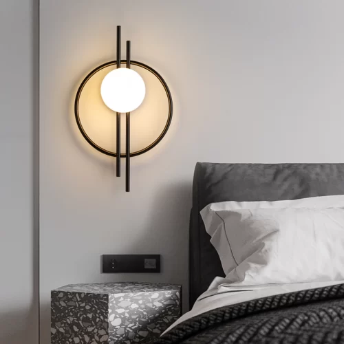 Black Circular Acrylic Wall Lamp at the bedside