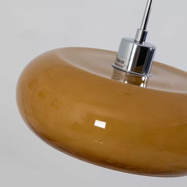 Close-up of Mid-Century Orange White Glass Chandelier, Showing milk tea color glass lampshade.