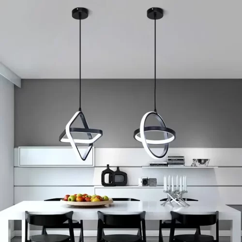 Black Simple Modern LED Pendant Lights, square and round, hang elegantly above the dining table.