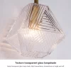 Close-up of Vintage Glass Wall Sconce, showing texture transparent glass lampshade.