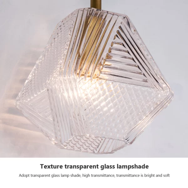 Close-up of Vintage Glass Wall Sconce, showing texture transparent glass lampshade.