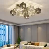 9 Heads Modern Square Crystal Ceiling Lights gracefully hang from the living room ceiling.