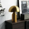 Big Size Gold Color Modern Mushroom LED Table Lamp standing on the walnut wood desk.