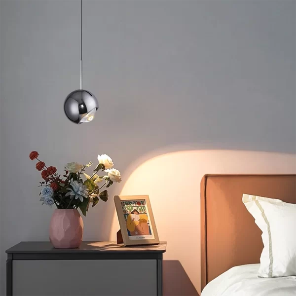 LED Glass Globe Pendant Light Fixture Bedroom Scene Display, Demonstrates the 45 degree lighting effect of the chandelier.