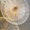 Close-up of Modern Round Glass Wall Lamp, showing the clear glass lampshade.