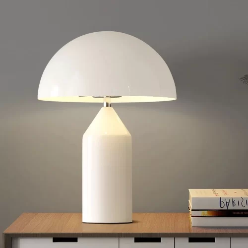 White Color Modern Mushroom LED Table Lamp standing on the wood desk and emitting neutral light.